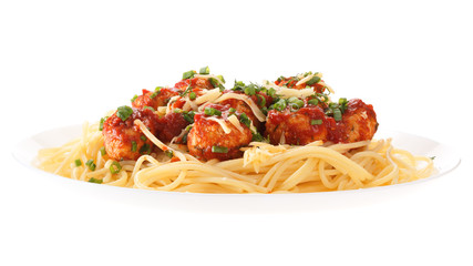 Spaghetti with meatballs with tomato sauce and cheese. Isolated on white background.