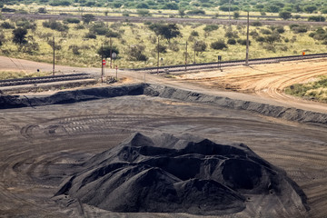Large piles of processed Manganese ore rock