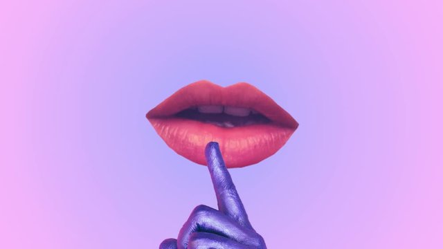 Minimal Motion design art. Painted hand show silence gesture on lips by finger