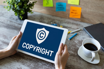 Copyright icon on screen. Patent Law and Intellectual Property. Business, Internet and Technology Concept.