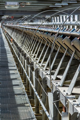Fototapeta premium Platinum Mining and Processing of ore, Platinum rock being moved on a conveyor belt
