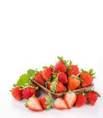A bowl of beautiful strawberries isolated on white background with clipping path, close up, macro.