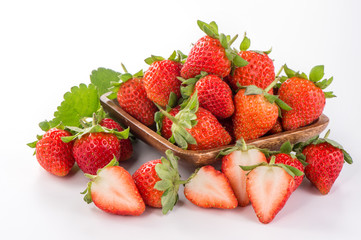 A bowl of beautiful strawberries isolated on white background with clipping path, close up, macro.