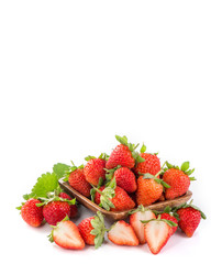 A bowl of beautiful strawberries isolated on white background with clipping path, close up, macro.