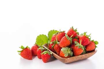 A bowl of beautiful strawberries isolated on white background with clipping path, close up, macro.