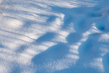 Background, texture - surface covered with fresh soft snow.