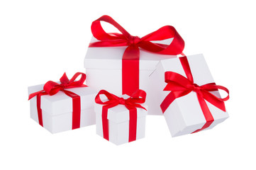 Stack of presents white gifts ribbon red bow isolated on white background