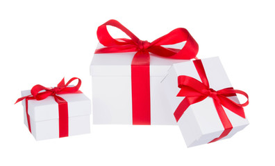 Stack of presents white gifts ribbon red bow isolated on white background