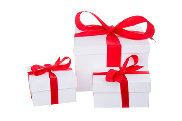 Stack of presents white gifts ribbon red bow isolated on white background