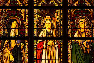 Details of a stained glass window at Notre Dame du Sablon Church in Brussels Belgium