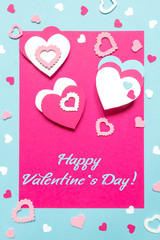 Valentine s Day greeting card. 14th of february. Happy Valentines Day Lettering with cut paper hearts on blue background