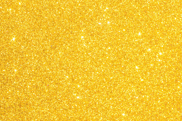 Gold glitter texture sparkling shiny wrapping paper background for Christmas holiday seasonal wallpaper  decoration, greeting and wedding invitation card design element