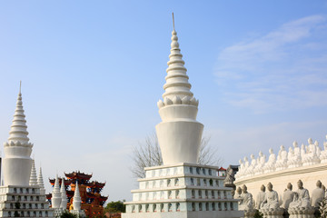 The beautiful white pagoda is under the blue sky - 239152612