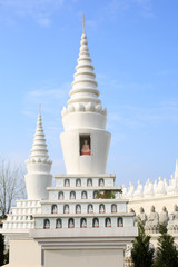 The beautiful white pagoda is under the blue sky - 239152666