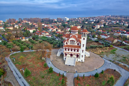 Aerophotography (drone) of Saint Raphael church of Platamonas with view of the village and sea
