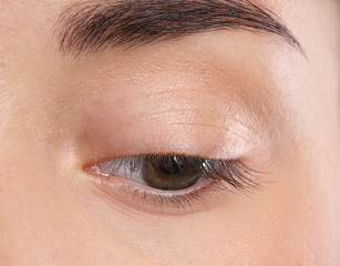 Obraz premium Young woman with beautiful natural eyelashes, closeup view