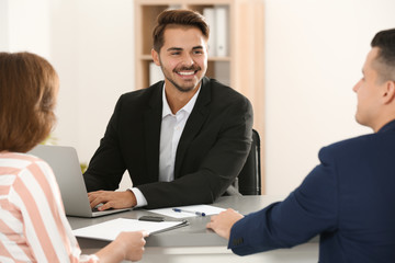 Human resources manager conducting job interview with applicants in office