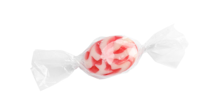 Wrapped delicious colorful candy on white background