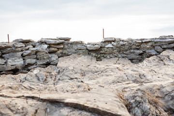 Isolated white stone fence