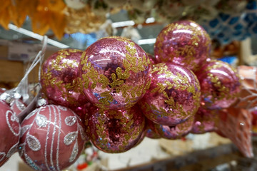 Colorful red pink christmas baubles for a christmas background - Image