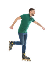 Young man with inline roller skates on white background