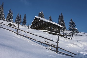 mountains winter landscape, wooden houses in hutzul ukrainian village, spectacular frosty sunny weather, amazing rural nature scenery