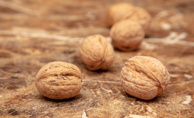 Walnuts on a marble table on the table