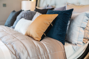 Bed maid-up with clean white pillows and bed sheets in beauty bedroom. Close-up. interior background