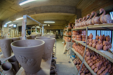 Inside pottery studio, ceramic storage