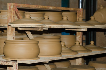 Pottery studio shelves storage clay cookware 