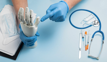 Artificial prosthesis hand at doctor.