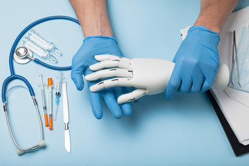 Bionic medical hand prosthesis. Amputation of arm.