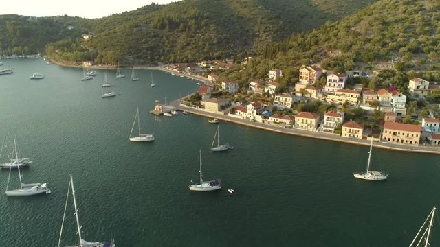 Aerial view above of group of boats anchored in the bay of Vathy Greece.