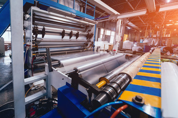 Modern automated production line in factory. Plastic bag manufacturing process