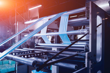 Modern automated production line in factory. Plastic bag manufacturing process