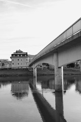 Fototapeta na wymiar Bridge over the river Salzach, in the suburb of Salzburg city, district Lehen. Austria, Europe.
