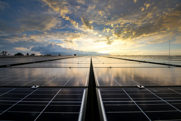 Fototapeta solar panels and sky sunset background obraz