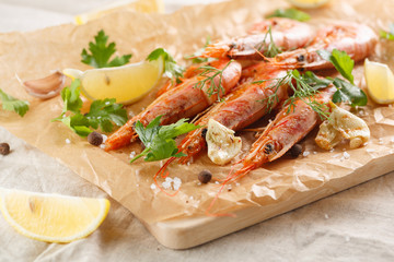 Grilled shrimps with spice, garlic and lemon. Grilled seafood.