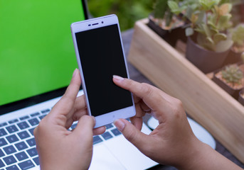women use the black screen tablet computer.