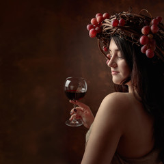  Beautiful girl with glass of red wine.