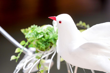 Artifact doll white dove.