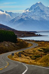 Washable wall murals Aoraki/Mount Cook Aoraki/Mount Cook, road and turquoise lake Pukaki view from Peter´s Lookout, South Island, New Zealand. Warm colours, clear sky, snowy mountain tops. Iconic scenic New Zealand photo. Must visit place!