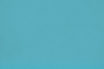 Texture of genuine leather, tender blue color, background. For your backdrop, with copy space