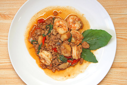 close up fried chopped pork and shrimp with sweet basil Thai style tasty dish