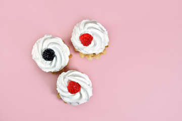 Protein cake basket with raspberry jelly berry on a pink background