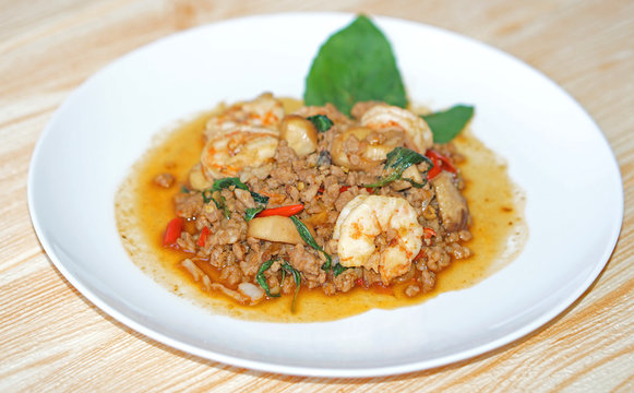 close up fried chopped pork and shrimp with sweet basil Thai style tasty dish