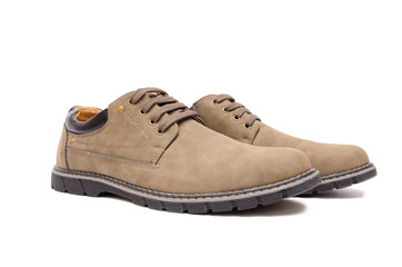 Brown suade shoes isolated on white background