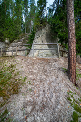 sandstone cliffs with tourist trail on river of gauja, Latvia