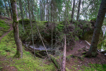 sandstone cliffs with tourist trail on river of gauja, Latvia