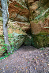 sandstone cliffs with tourist trail on river of gauja, Latvia